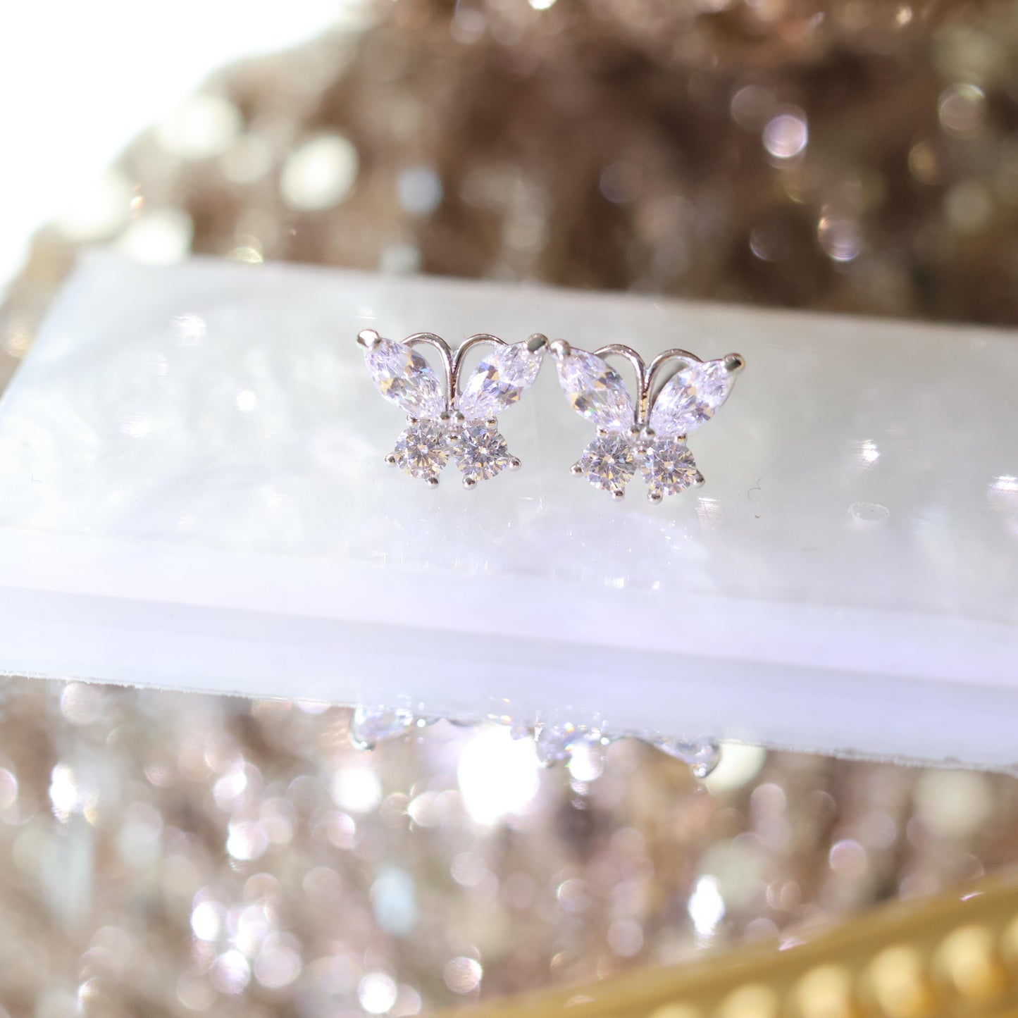 Luminous Flutter Earrings