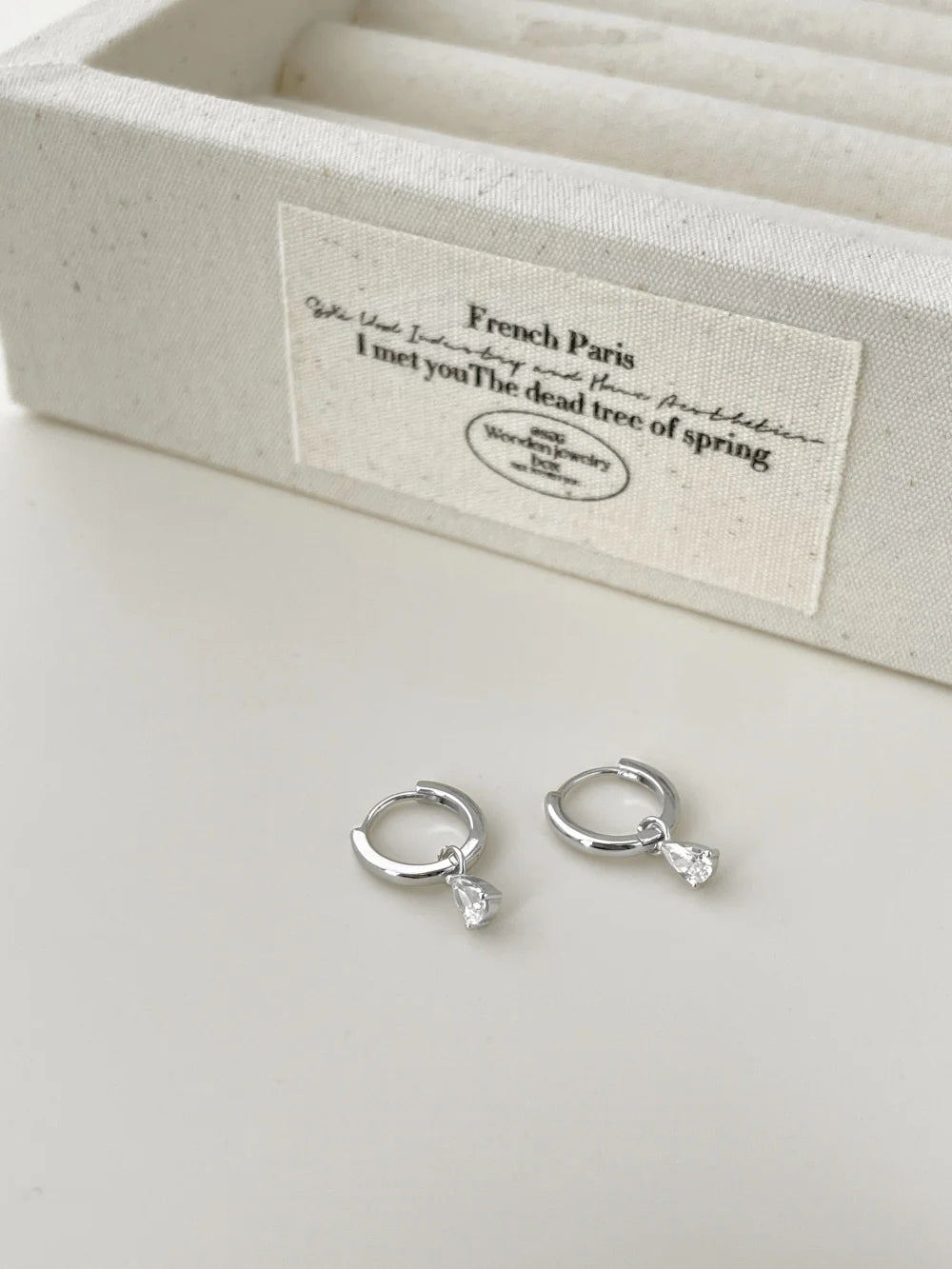 "Pearlucent Drop" pear-shaped diamond drop earrings