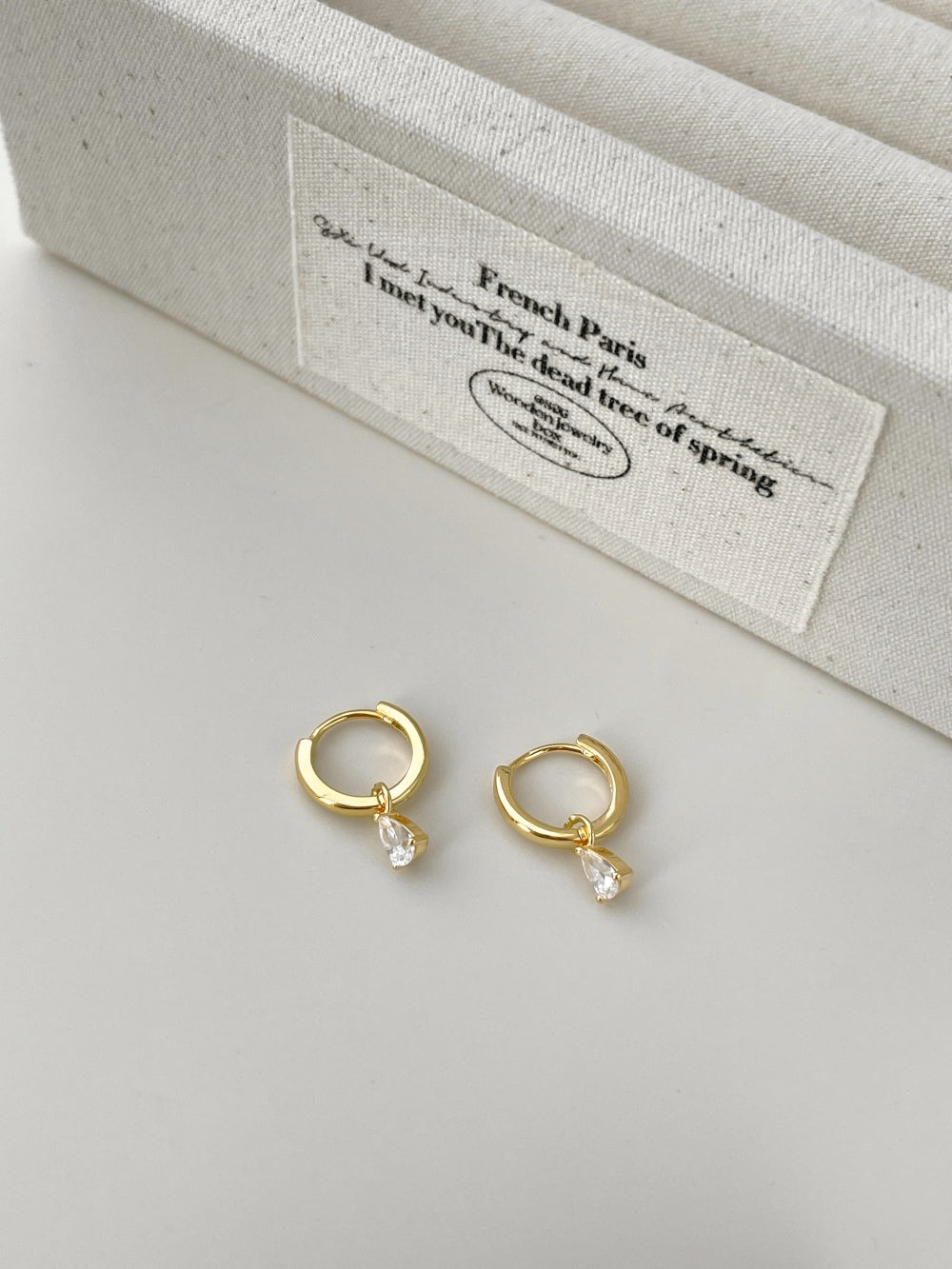 "Pearlucent Drop" pear-shaped diamond drop earrings